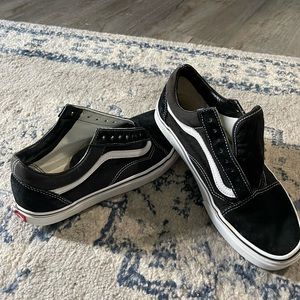 Vans Old Skool black and white womens 9.5. Gently used. Worn 2 times